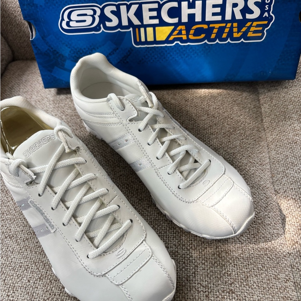 NIB Skechers. White with subtle rhinestones on sides. Size 8